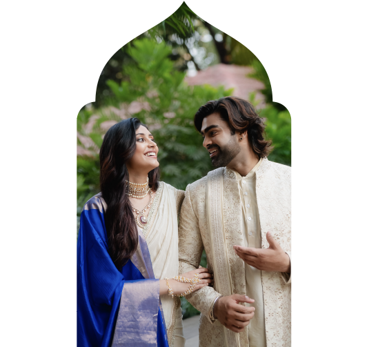 A bride and groom in wedding attire, ready and radiant